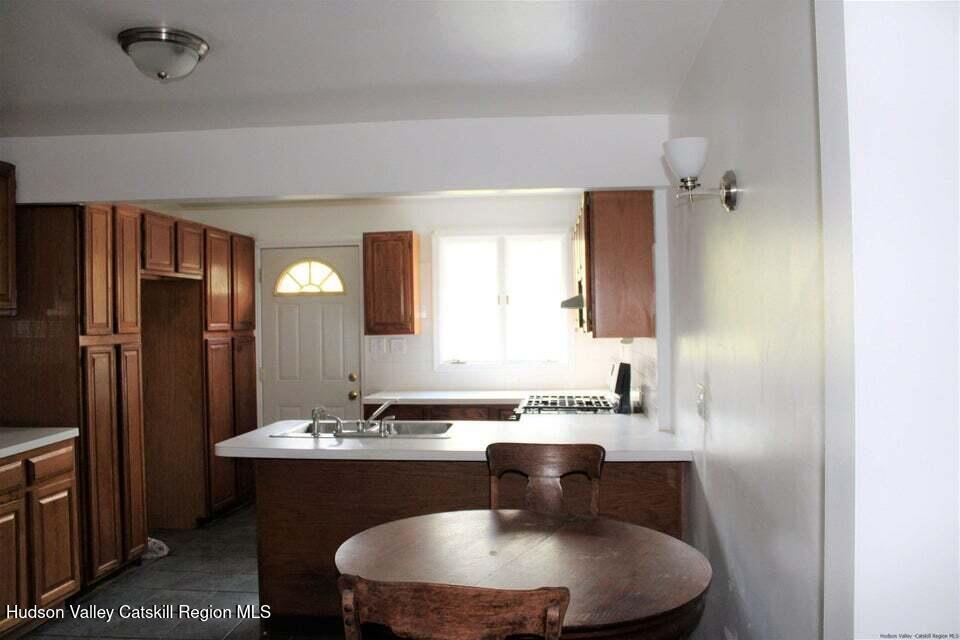 119 Baker Road Kerhonkson, NY 12446 - Photo 9 of 15 a bathroom with a sink and a mirror