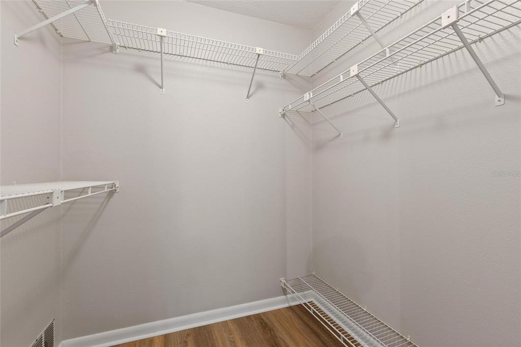 11241 Rollingwood Drive Port Richey, FL 34668 - Photo 16 of 26 a view of a room with racks on the wall