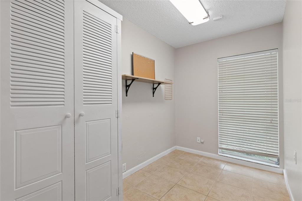 11241 Rollingwood Drive Port Richey, FL 34668 - Photo 23 of 26 a view of a livingroom with a window