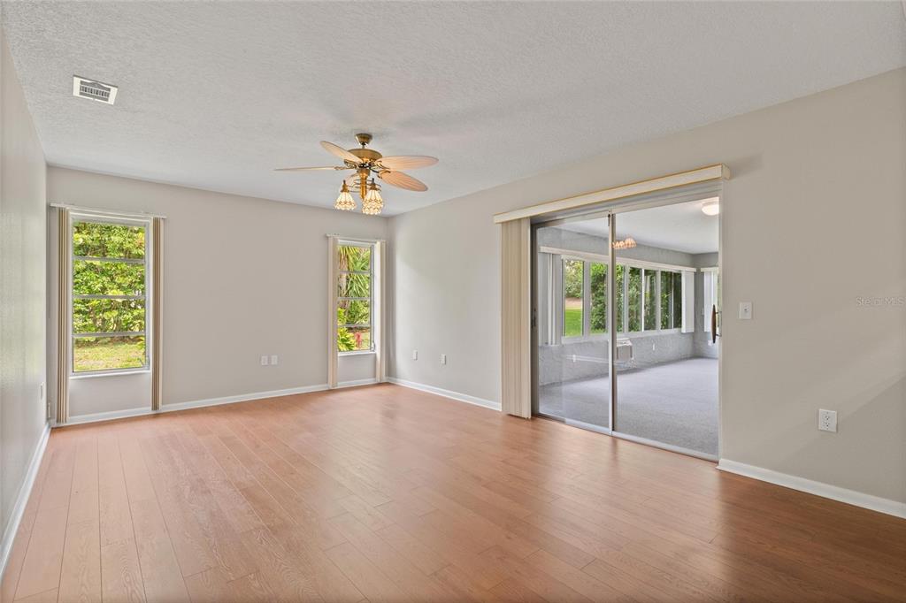11241 Rollingwood Drive Port Richey, FL 34668 - Photo 6 of 26 a view of an empty room with window