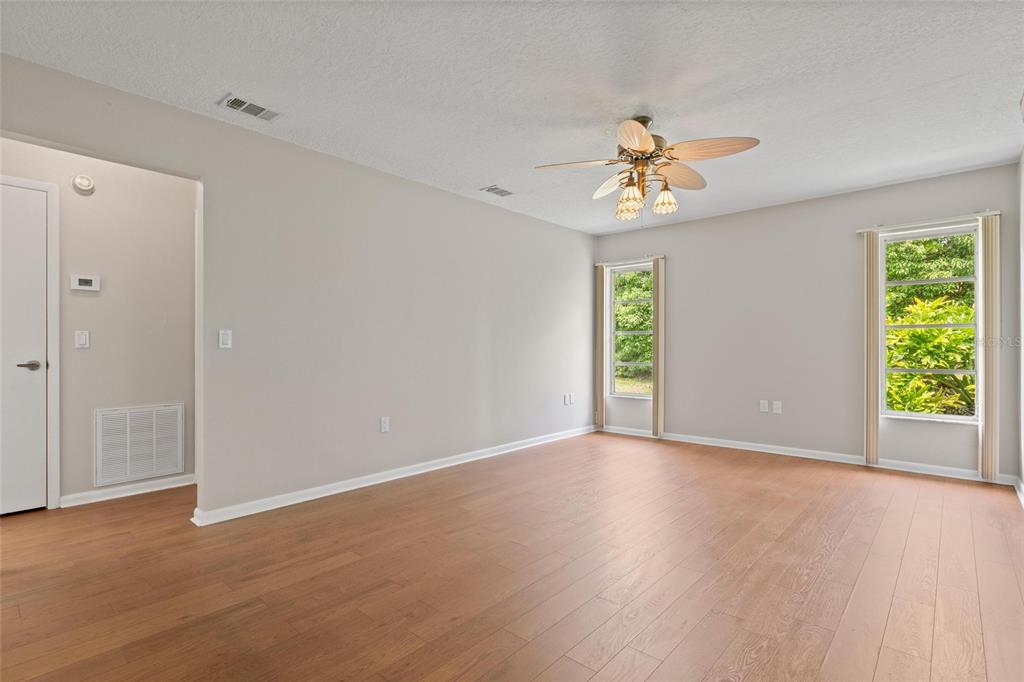 11241 Rollingwood Drive Port Richey, FL 34668 - Photo 7 of 26 a view of an empty room with a window