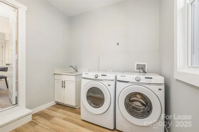 a utility room with dryer and washer