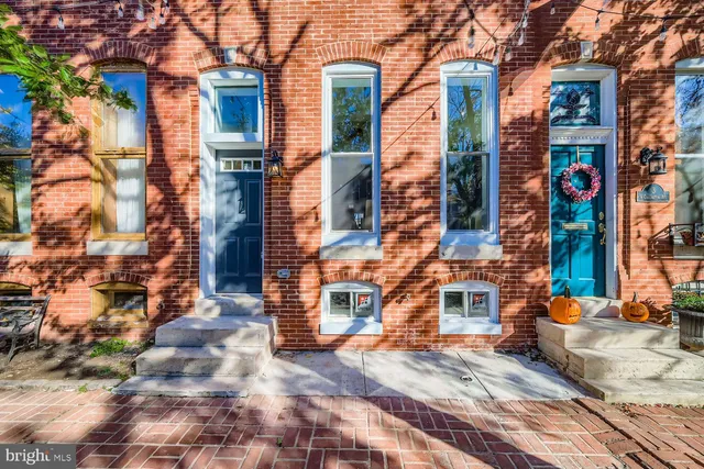 a front view of a multi story residential apartment building