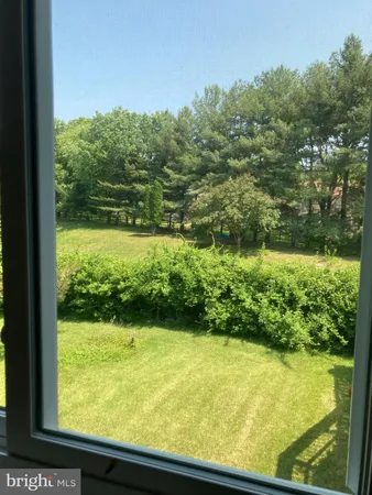 a view of a lake from a window