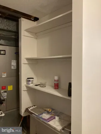 a room with storage and utility