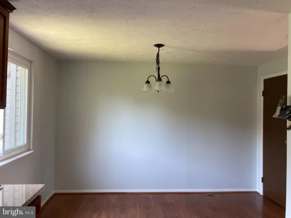 a view of a room with a window