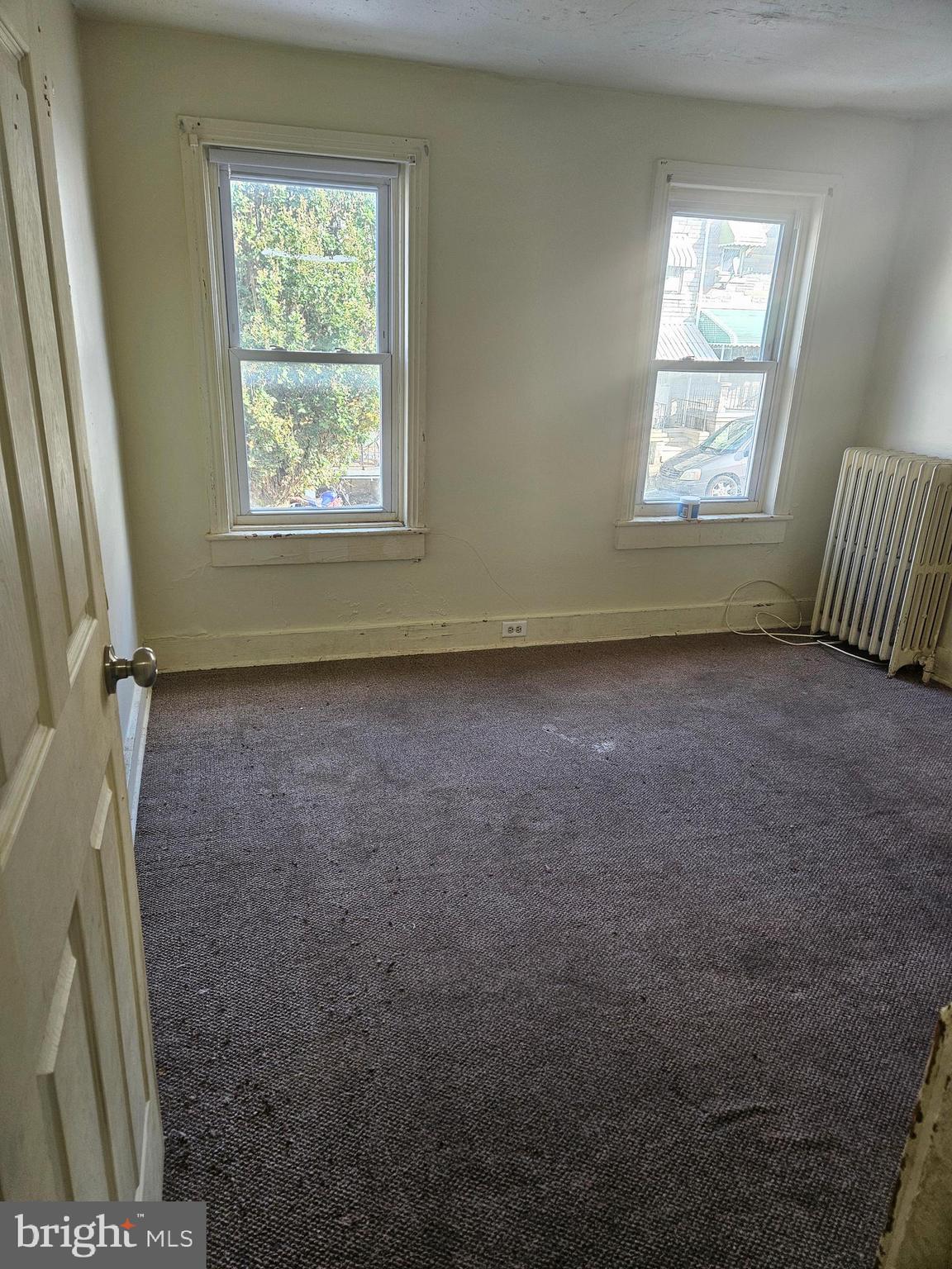 522 South 12th Street Reading, PA 19602 - Photo 8 of 12 a view of an empty room with windows