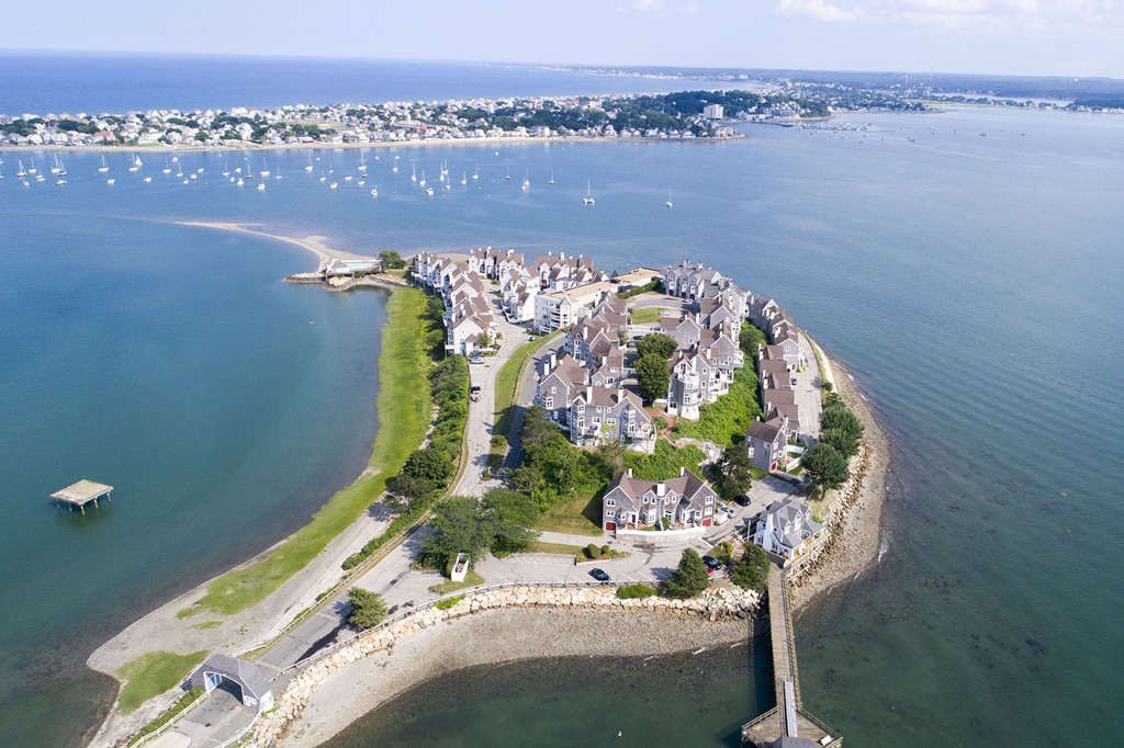 304 Commodore Court, Unit 304 Hull, MA 02045 - Photo 1 of 12 an aerial view of a house