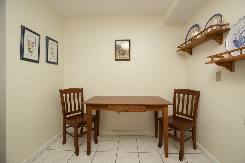 304 Commodore Court, Unit 304 Hull, MA 02045 - Photo 7 of 12 a view of a workspace with furniture