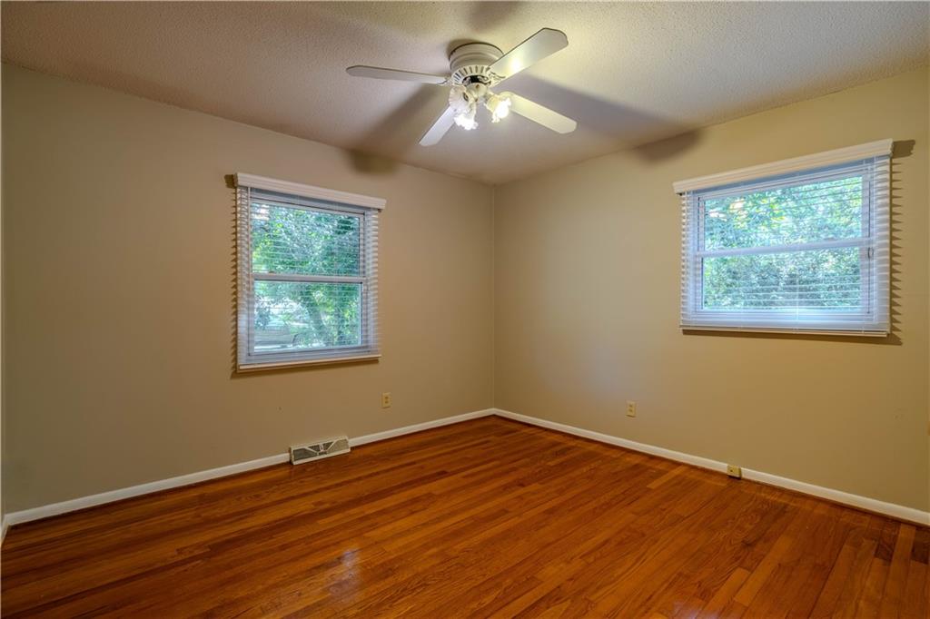 16 Drexel Drive Northwest Rome, GA 30165 - Photo 13 of 27 a view of a room with wooden floor and a window