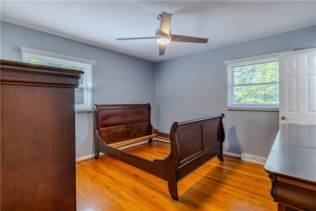 16 Drexel Drive Northwest Rome, GA 30165 - Photo 17 of 27 a bedroom with a bed and wooden floor
