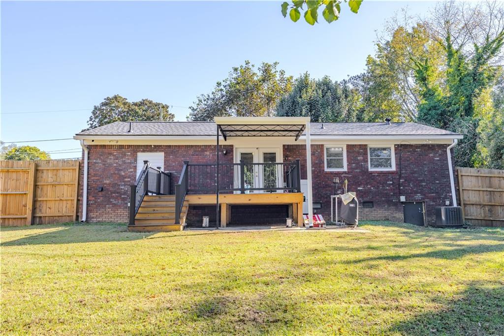 16 Drexel Drive Northwest Rome, GA 30165 - Photo 26 of 27 a view of a house with swimming pool and a yard