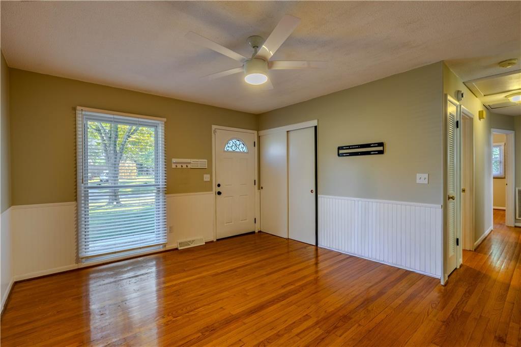 16 Drexel Drive Northwest Rome, GA 30165 - Photo 6 of 27 wooden floor in an empty room with a window