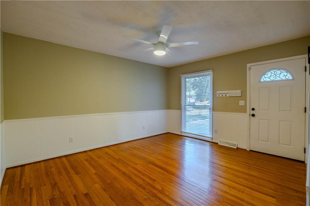 16 Drexel Drive Northwest Rome, GA 30165 - Photo 7 of 27 a view of an empty room with wooden floor