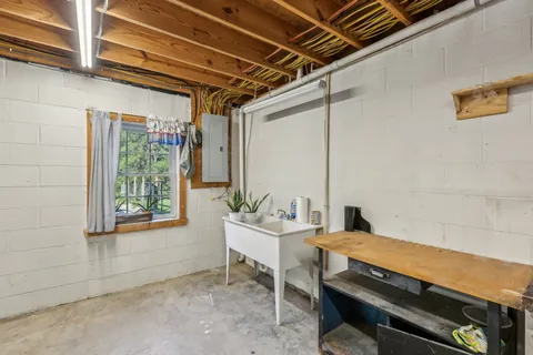 a backyard of a house with outdoor seating