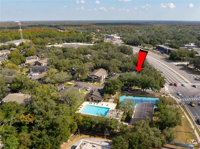 an aerial view of a city with ocean view