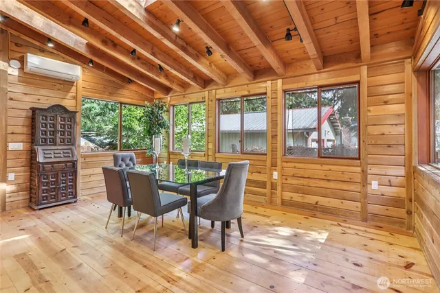 a view of a chairs and table in the patio