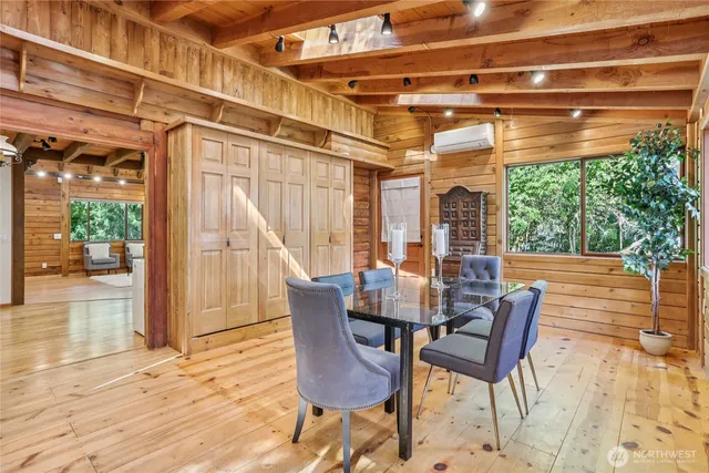 a view of a patio with a table and chairs