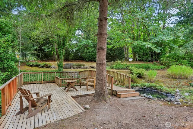a view of a chair and table in the patio