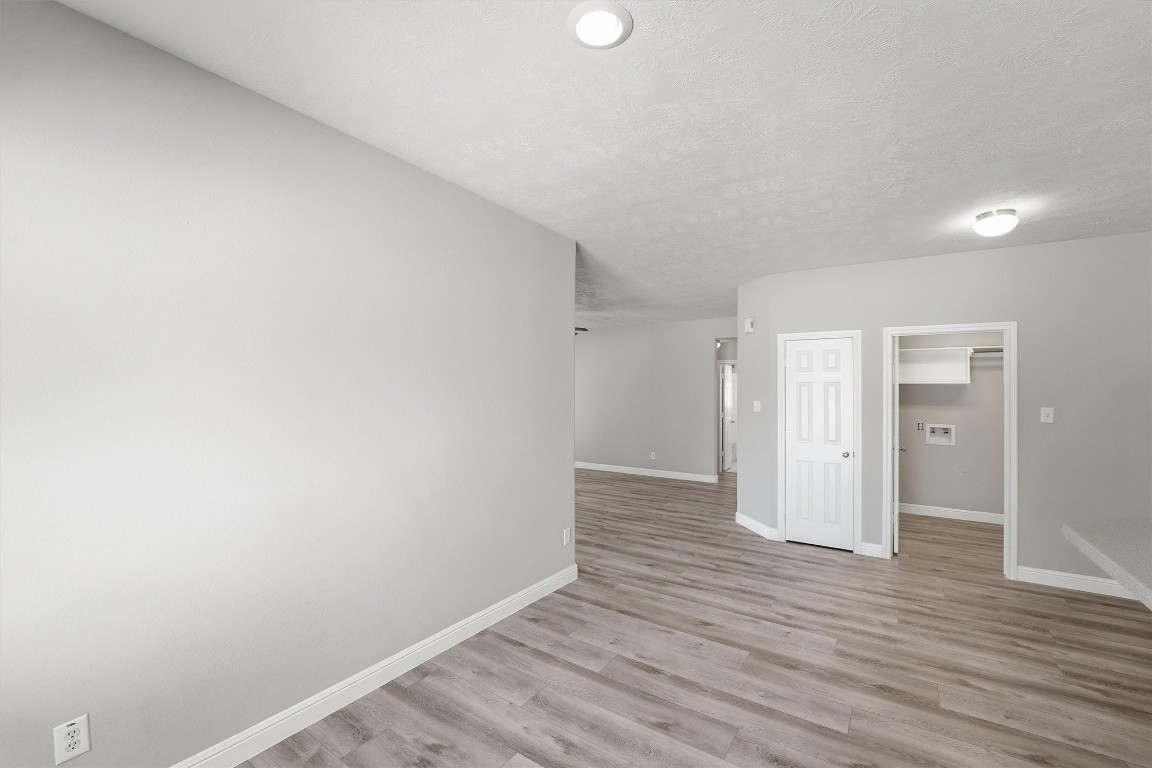 23301 Tuttle Court Porter, TX 77365 - Photo 21 of 50 a view of an empty room and wooden floor