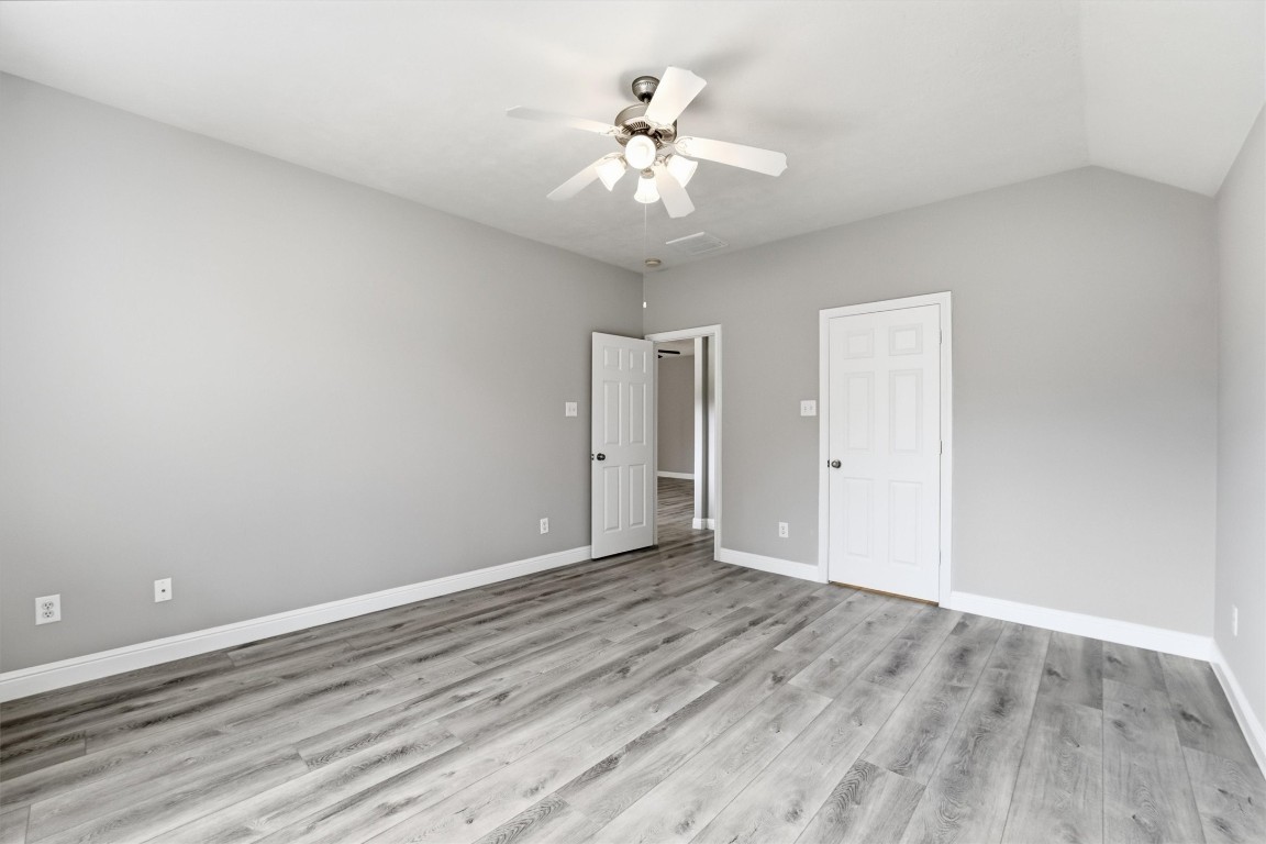 23301 Tuttle Court Porter, TX 77365 - Photo 28 of 50 a view of an empty room with wooden floor