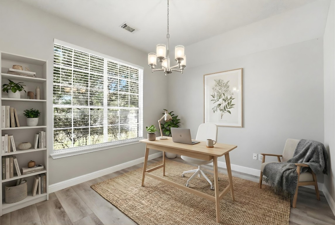 23301 Tuttle Court Porter, TX 77365 - Photo 6 of 50 a workspace with furniture window and wooden floor