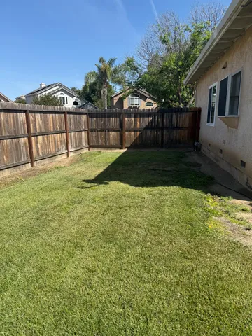 a view of a backyard with a garden