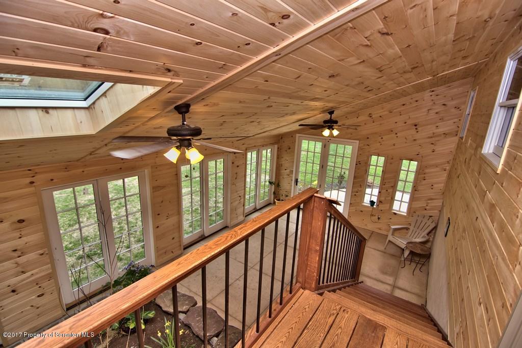 5275 Bloomington Road Moscow, PA 18444 - Photo 13 of 48 a view of balcony with wooden floor