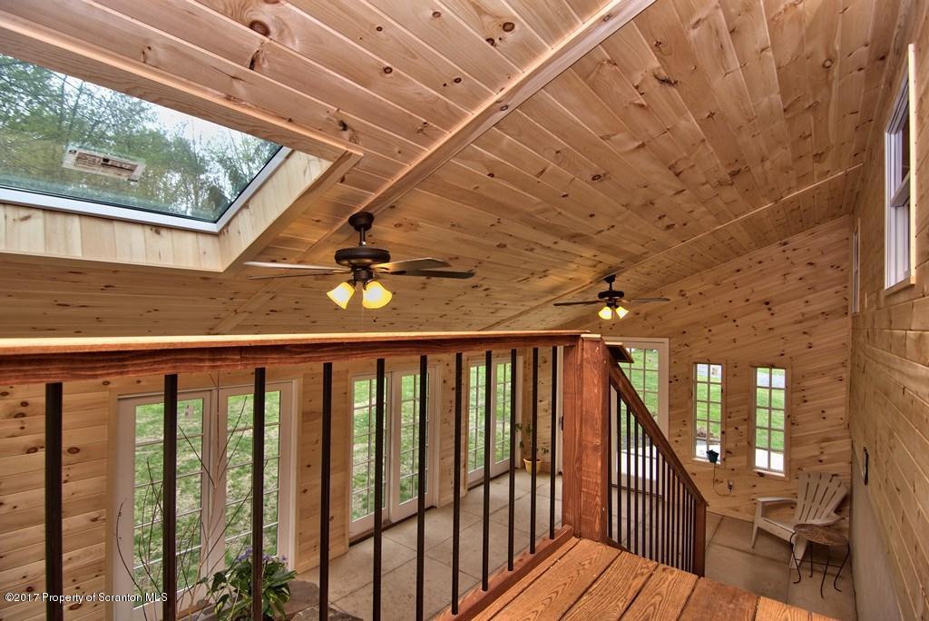 5275 Bloomington Road Moscow, PA 18444 - Photo 14 of 48 a view of wooden balcony with wooden floor