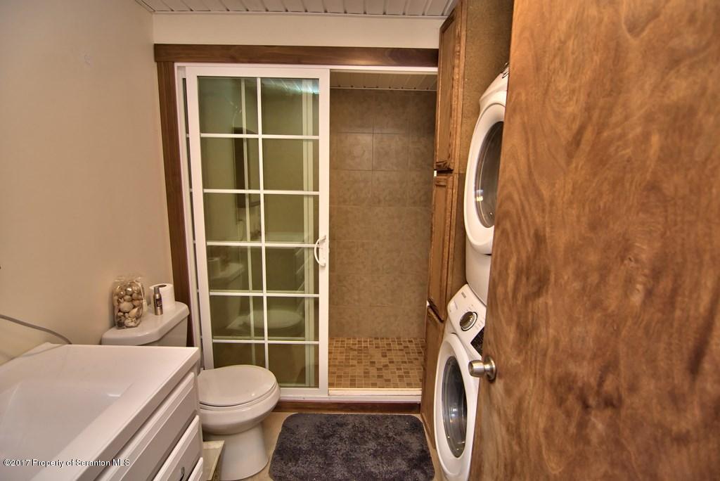 5275 Bloomington Road Moscow, PA 18444 - Photo 29 of 48 a bathroom with a toilet and shower