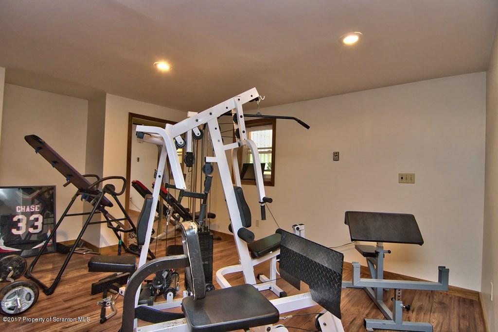 5275 Bloomington Road Moscow, PA 18444 - Photo 32 of 48 a view of a room with gym equipment
