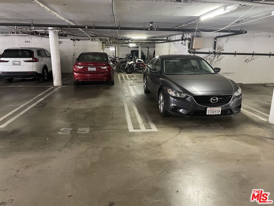 3640 Cardiff Avenue, Unit 108 Los Angeles, CA 90034 - Photo 14 of 14 a view of parking garage with cars parked