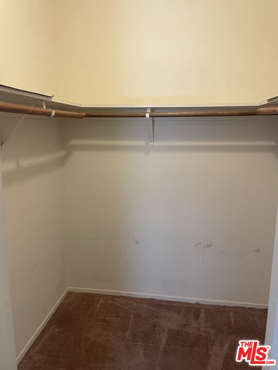 3640 Cardiff Avenue, Unit 108 Los Angeles, CA 90034 - Photo 9 of 14 a view of a room with racks on the wall