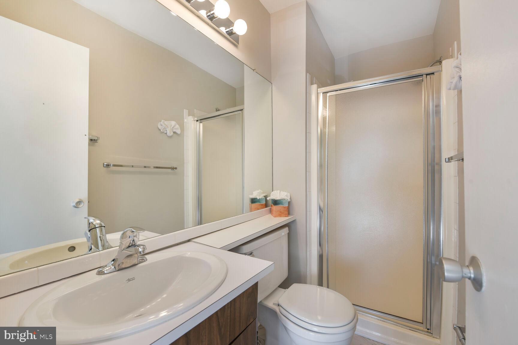 1526 Scandia Circle Reston, VA 20190 - Photo 13 of 22 a bathroom with a sink toilet and shower