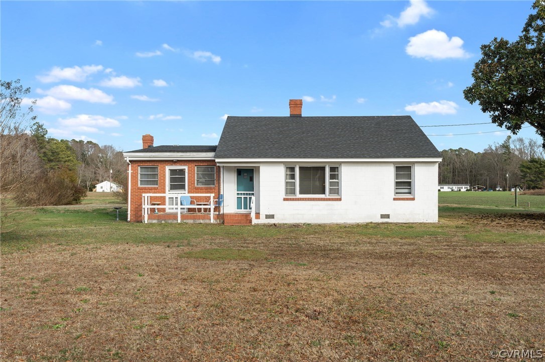2859 East River Road Cardinal, VA 23025 - Photo 1 of 33 a front view of a house with a garden