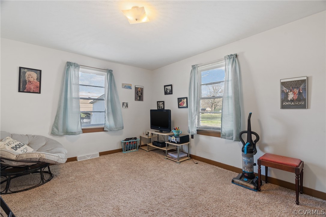 2859 East River Road Cardinal, VA 23025 - Photo 14 of 33 a view of a livingroom with workspace and a window