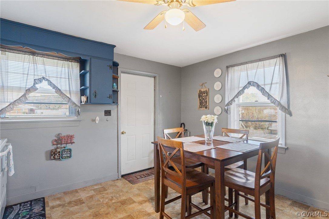 2859 East River Road Cardinal, VA 23025 - Photo 23 of 33 a view of a dining room with furniture and a chandelier