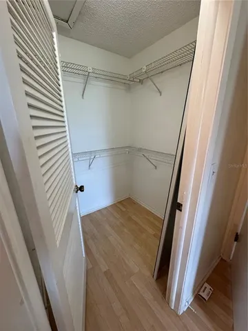 a bathroom with a toilet sink and shower