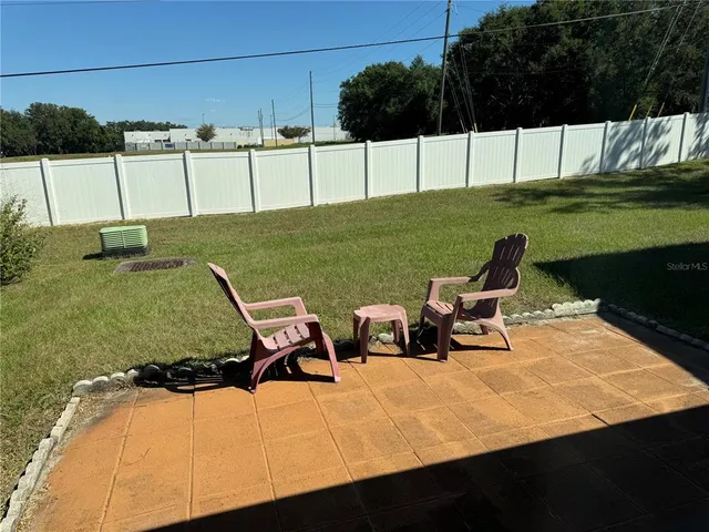 a view of street with parked cars