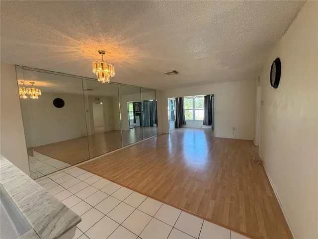 a view of a livingroom with wooden floor