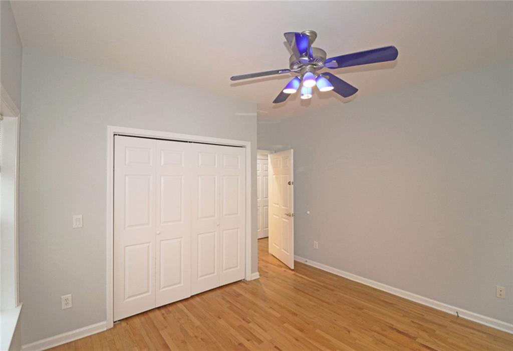 100 Wiley Hills Trail Woodstock, GA 30188 - Photo 27 of 39 a view of a livingroom with wooden floor