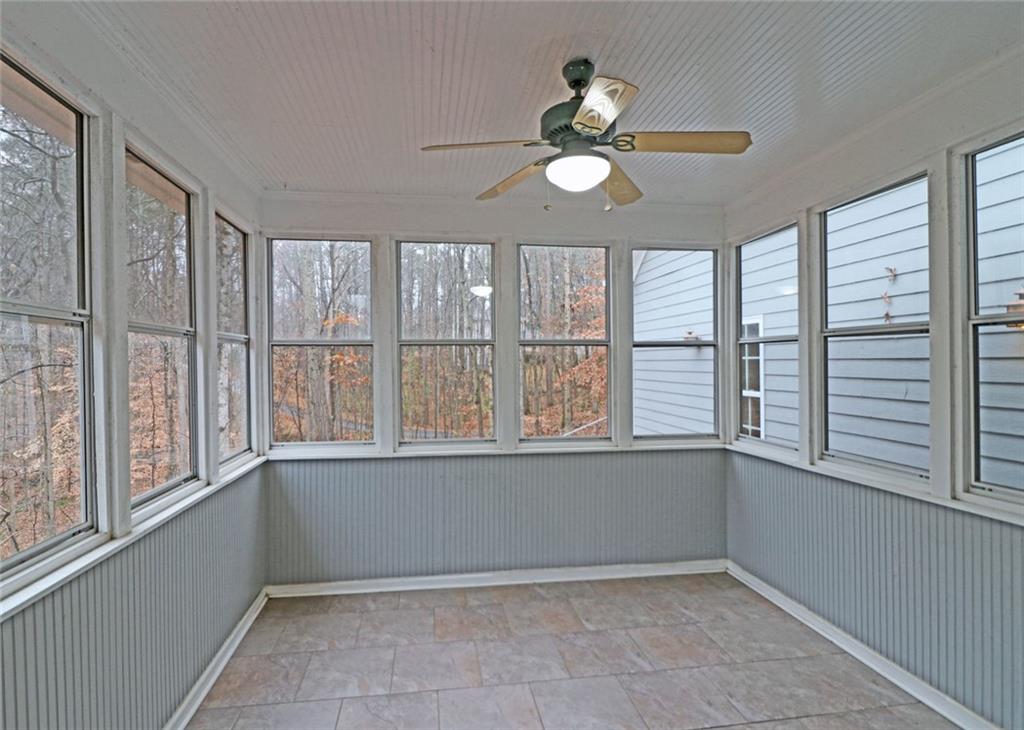 100 Wiley Hills Trail Woodstock, GA 30188 - Photo 28 of 39 a view of an empty room with a window