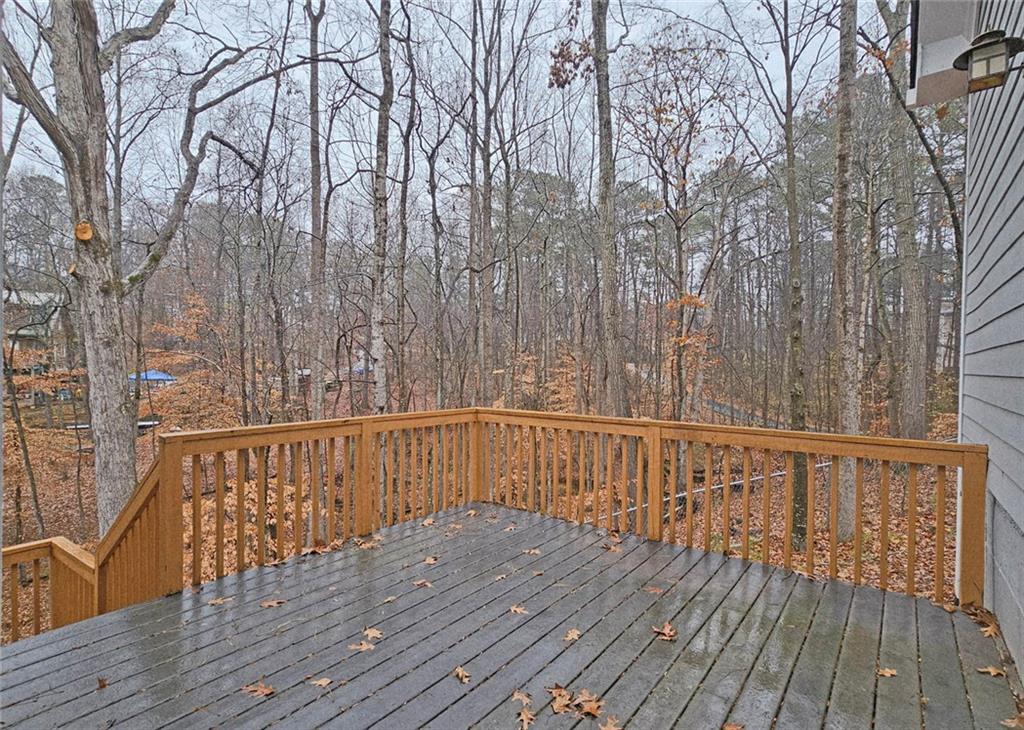 100 Wiley Hills Trail Woodstock, GA 30188 - Photo 31 of 39 a view of deck with wooden floor and fence