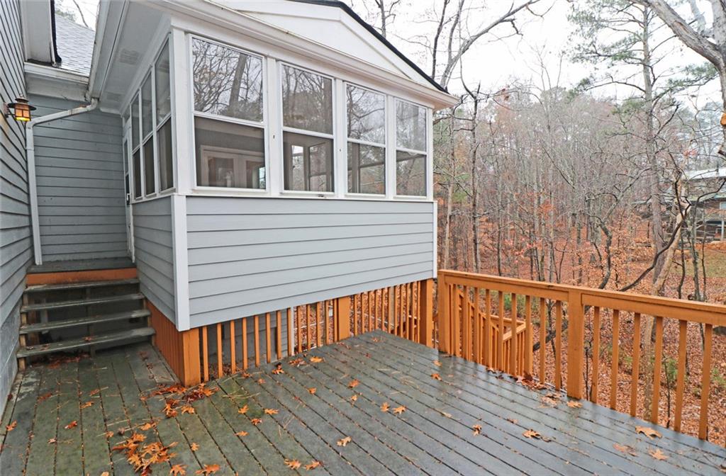 100 Wiley Hills Trail Woodstock, GA 30188 - Photo 32 of 39 a view of wooden balcony with wooden floor and fence