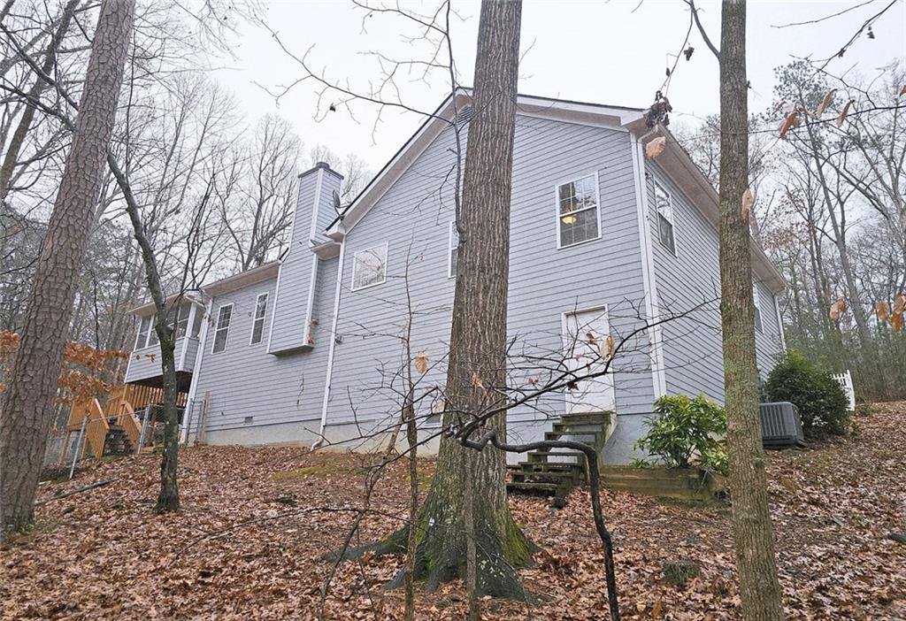 100 Wiley Hills Trail Woodstock, GA 30188 - Photo 36 of 39 a backyard of a house with lots of green space
