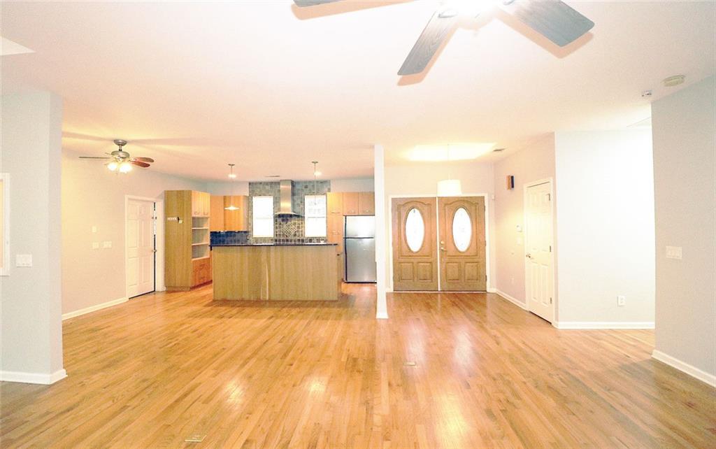 100 Wiley Hills Trail Woodstock, GA 30188 - Photo 4 of 39 a view of a kitchen cabinets and wooden floor