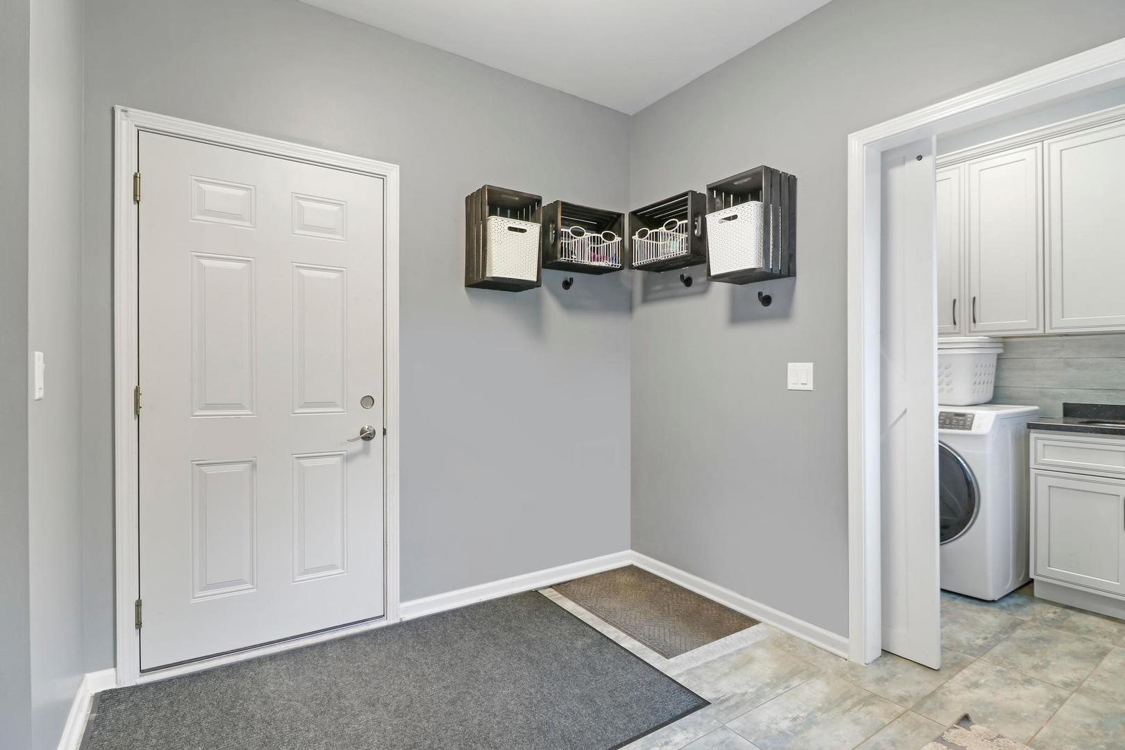 39247 Rangers Way Antioch, IL 60002 - Photo 20 of 33 a view of a storage & utility room with washer and dryer