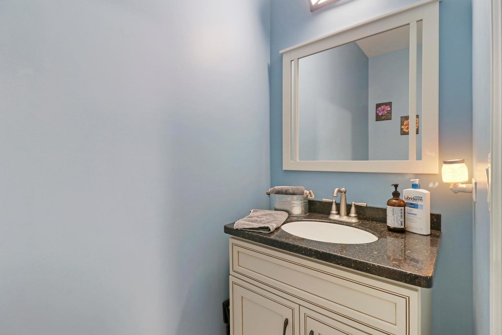 39247 Rangers Way Antioch, IL 60002 - Photo 21 of 33 a bathroom with a sink and a mirror