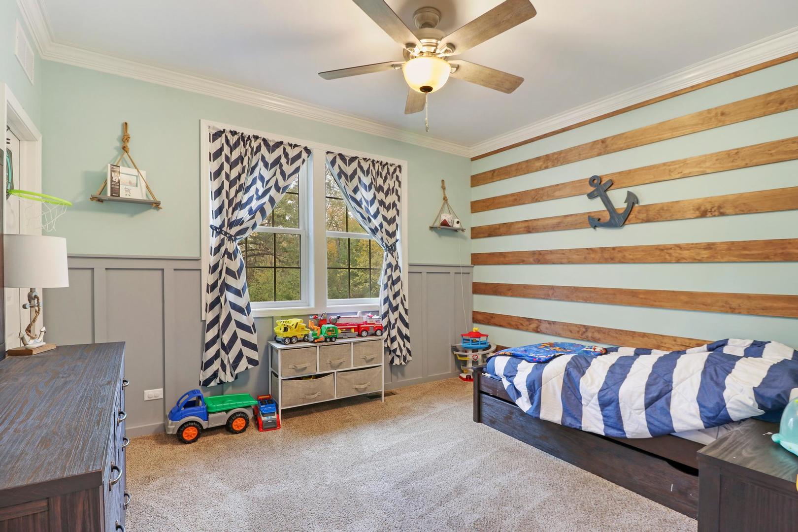 39247 Rangers Way Antioch, IL 60002 - Photo 26 of 33 a living room with furniture and stairs