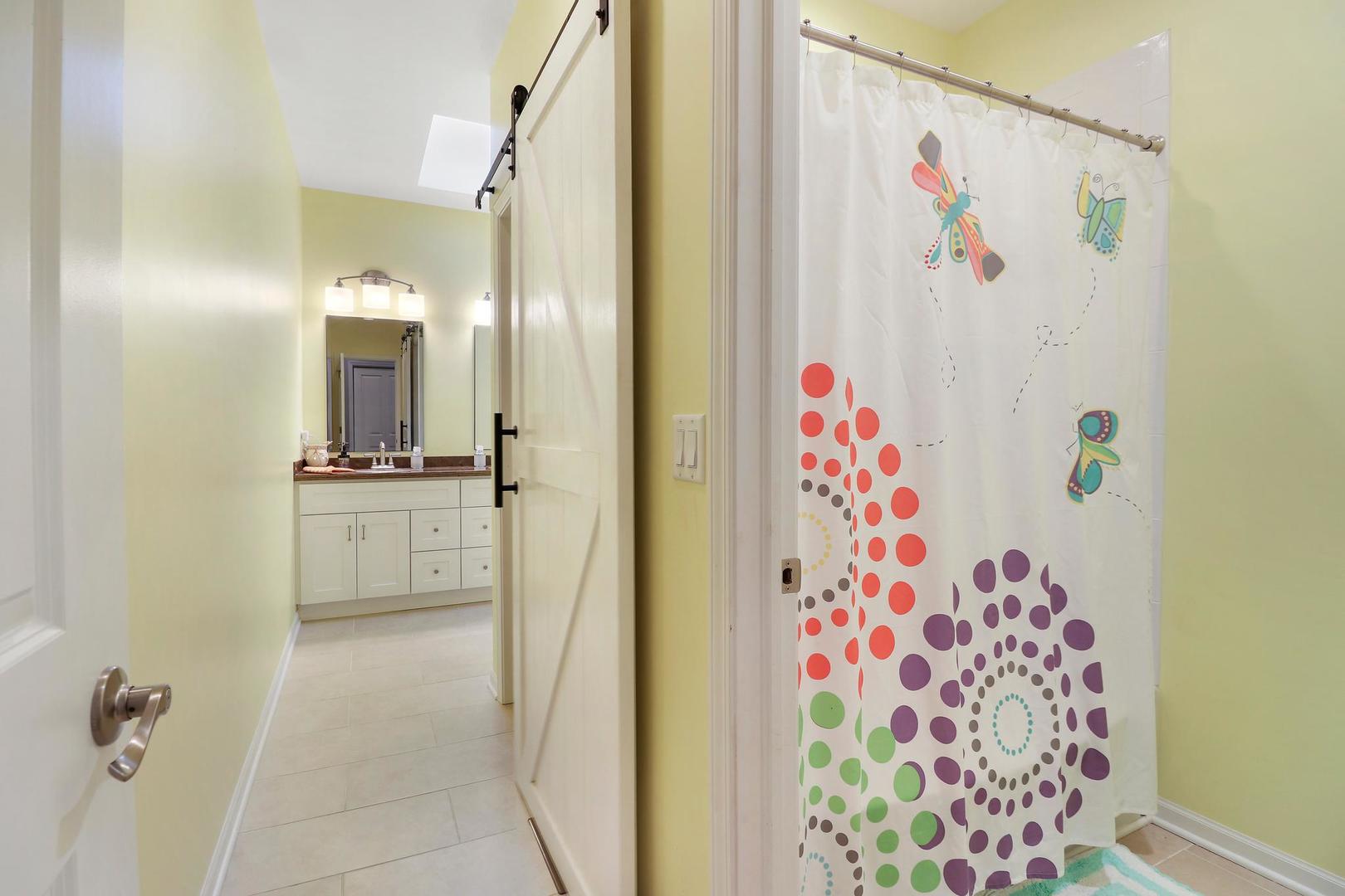39247 Rangers Way Antioch, IL 60002 - Photo 28 of 33 a bathroom with a bathtub and a shower